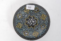 A fabulous Persian enamel and silver rimmed plate.