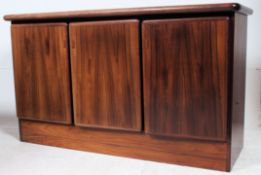 A retro 1970's rosewood sideboard ( Possibly SKOVBY ) Three push fit front doors with four slide