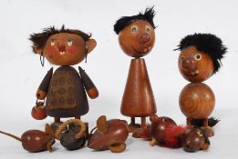 A set of 1960's wooden troll figurines , one being a corkscrew, a bottle opener, pen holder, mice,
