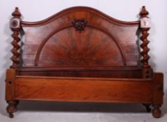 A Victorian mahogany double bed.
