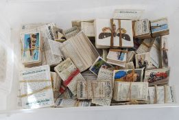 CIGARETTE CARDS; A collection of assorted loose vintage cigarette cards,