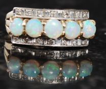 A 14ct gold opal and diamond ring. Measures:3.4g size J.