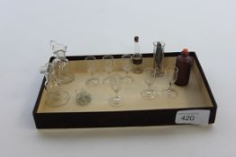 A 19th century miniature glass set comprising wine glasses, bottles, ewer,