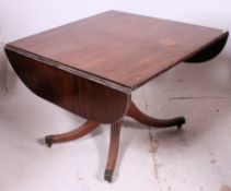 A good large 19th century Regency solid mahogany dining table raised on splayed reeded cabriole