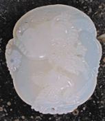 A 20th century white jade carved pendant depicting a dragon and swan.