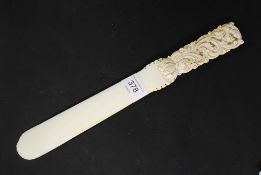 A fine example of a 19th century carved ivory page turner,