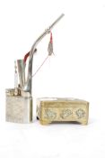 A decorative 20th century brass box cast in relief together with a Chinese water pipe with