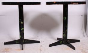 A pair of unusual 20th century ebonised toleware style retro cafe table raised on quadruped bases