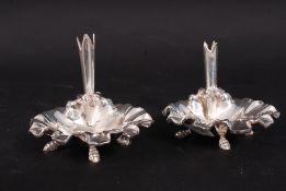 A pair of decorative Art Nouveau silver plated salts having rising tapered stem vase centres