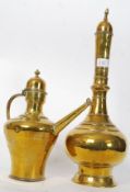 A polished brass Turkish coffee pot with long spout together with a tall Turkish water jug complete