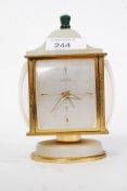 A Swiss ' Angelus ' onyx cased compendium, fitted clock, thermometer, barometer,