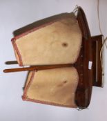 An original teak 1950's retro lamp in the shape of a sailing boat yacht. Standing on a squared base.