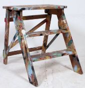 A small Vintage folding step ladder. Fully paint 