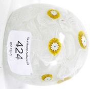 A decorative 20th century good quality glass paperweight with swirl and millefiori flower heads,