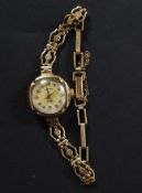 A vintage ladies 9ct gold Roamer cocktail watch, with 9ct gold bracelet.  Weight 13.