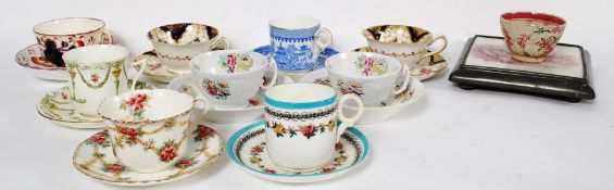 A collection of 9 19th century Victorian tea cups and saucers to include Imari pattern, foliate etc.
