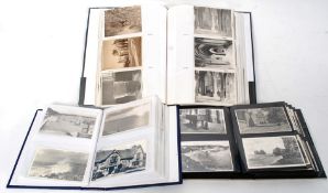 Three albums of photographic topographical views.