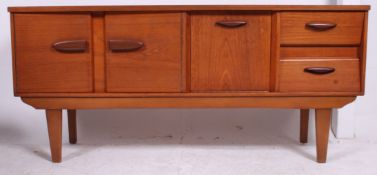 A Vintage Teak sideboard with angled drawer fronts, drop down drinks cabinet to centre.