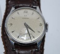 A gentlemans mid 20th century vintage Omega wristwatch having baton and qtr numeral face with