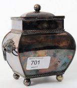 A Victorian / Edwardian silver plated tea caddy with lion handles standing on four feet.