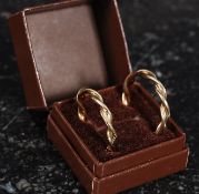 A pair of 9ct gold ladies oval creole earrings, weight 2.