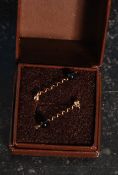 A pair of 9ct gold ladies onyx and swirl drop earrings