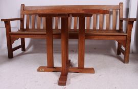 A good quality ( kept indoors ) 20th century large teak garden bench having slatted seat and back