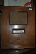 A vintage 1930's / 1940's Lisson radio with turn dial to front, wooden cased,
