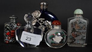 A collection of 5x Chinese snuff bottles, two being glass, one armorial, one being a perfume bottle.