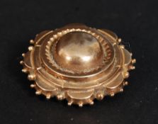 A 9ct gold Victorian hair locket brooch, the rear with glass panel having hair inside with pin.