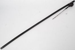 A 20th century ebonised sword stick / waking stick.