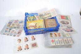 CIGARETTE CARDS; A collection of assorted vintage cigarette cards,