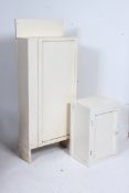 A painted early 20th century shelved closed cupboard along with another painted cupboard.