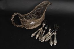 A 20th century retro wirework vintage wine pourer of solid construction with handle atop