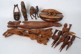 A mixed collection of African wooden carvings to include Zulu etc please see images.