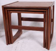 A 1960's G-Plan Kelso teak wood graduating nest of tables having angled legs with graduating tops