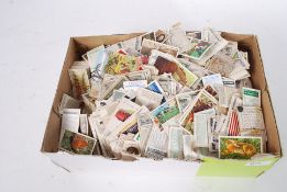 CIGARETTE CARDS: A LARGE collection of assorted vintage loose cigarette cards to include part sets