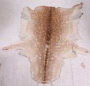 A vintage Deer skin floor rug