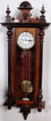 A 19th century Vienna regulator wall clock in walnut case in the manner of Gustav Becker.