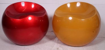 A pair of 20th century retro style garden pearlescent plastic garden ball orb chairs.