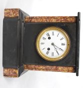 A 19th century Victorian slate mantel clock having enamel face with brass 8 day movement.