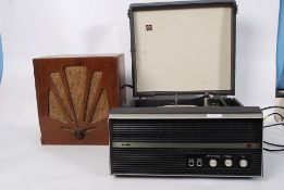 A vintage 1970's Bush portable record player in blue case with original fitments.