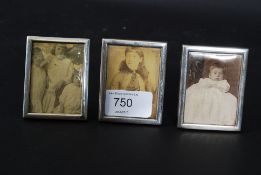 3 silver hallmarked miniature photograph frames marked HH with other marking. Total weight 50.