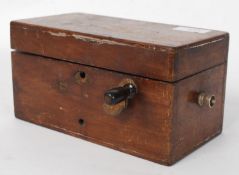 An antique ' Patent Magneto Electric Shock Machine ' 'For Nervous Diseases' within the original