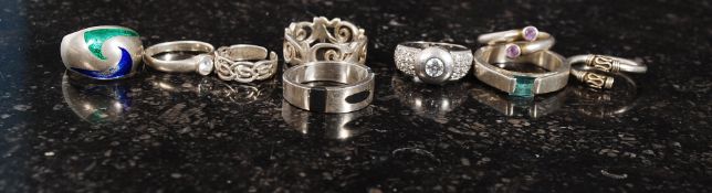 A  collection of 7 silver 925 ladies dress rings to include stone set, twist, cocktail rings etc.