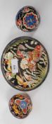 A decorative early 20th century coloured handpainted glass dish with medieval scene together with 2