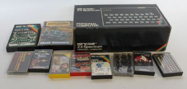 An excellent boxed original ZX Spectrum 48k personal computer complete with a selection of games to