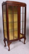 A 1930's Art Deco mahogany upright display cabinet.