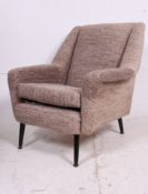 A 1970's retro armchair raised on chrome legs having the original wool upholstered overstuffed seat