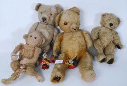 A Collection of vintage teddy bears, some mohair, straw filled,